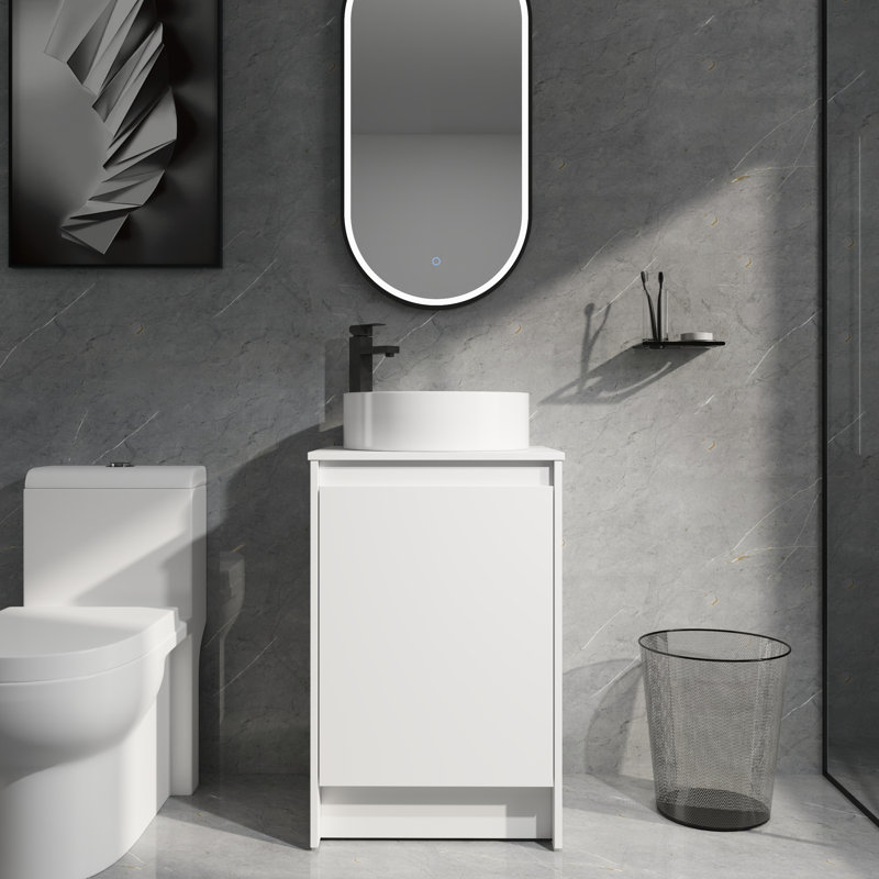 Meuble-lavabo de 20 po avec lavabo en céramique et portes à fermeture douce