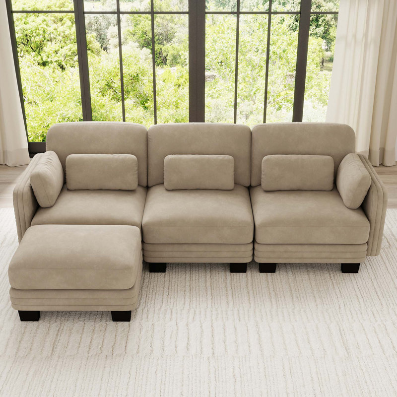 Canapé d'angle modulaire capitonné avec pouf amovible