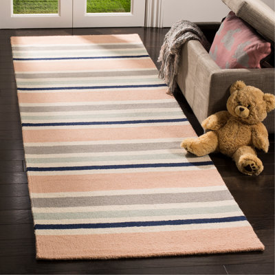 Tapis rayé ivoire / orange en laine touffeté à la main Kruetzen