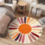 Mignon tapis lavable à la machine Sunburst-555790919