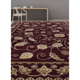 Dharma Floral Area Rug in Red/Beige