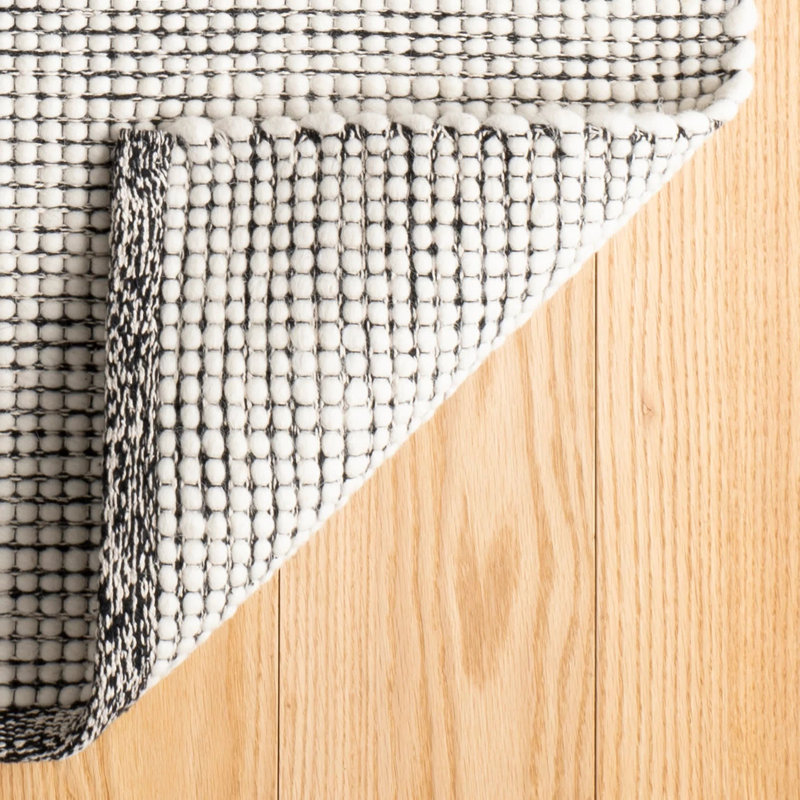 Tapis noir en laine tissé à la main, Rectangle 2 pi x 3 pi