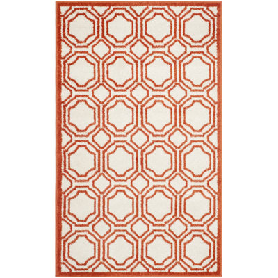 McMillian Geometric Hand Woven Indoor / Outdoor Area Rug