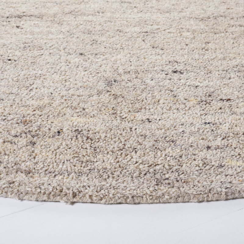 Jaycee Hand Tufted Wool/Cotton & Other Fiber Solid Color Rug in Ivory, Round 7'