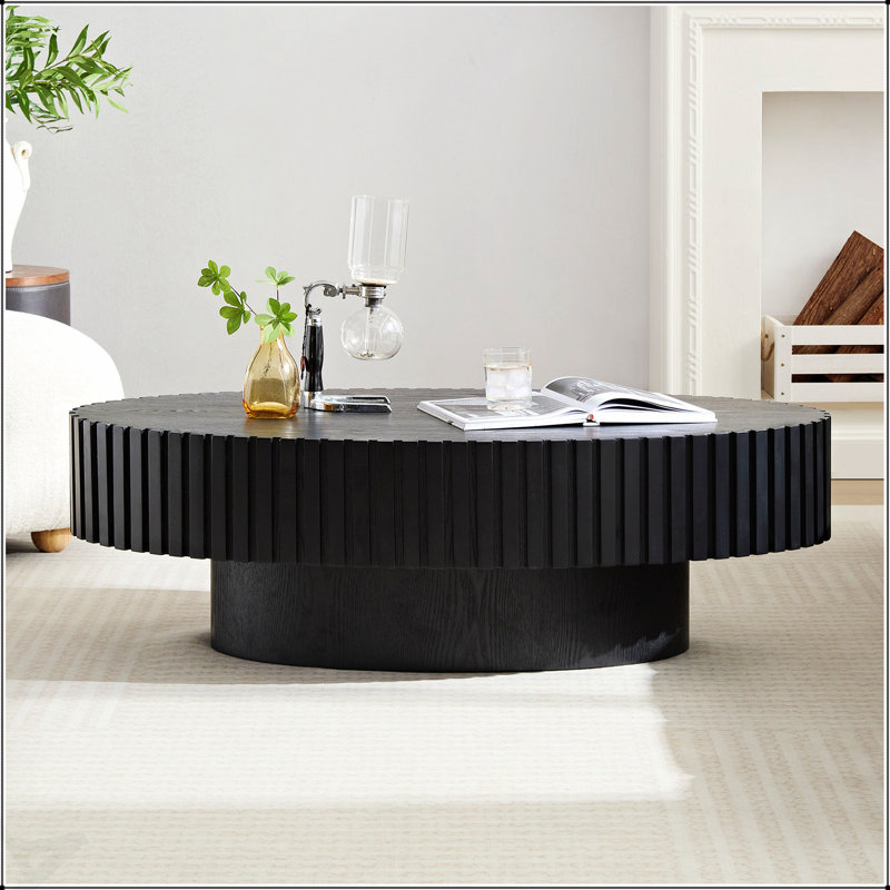Table basse moderne moderne fabriquée à la main avec un piédestal robuste, parfaite pour les petits salons et les chambres