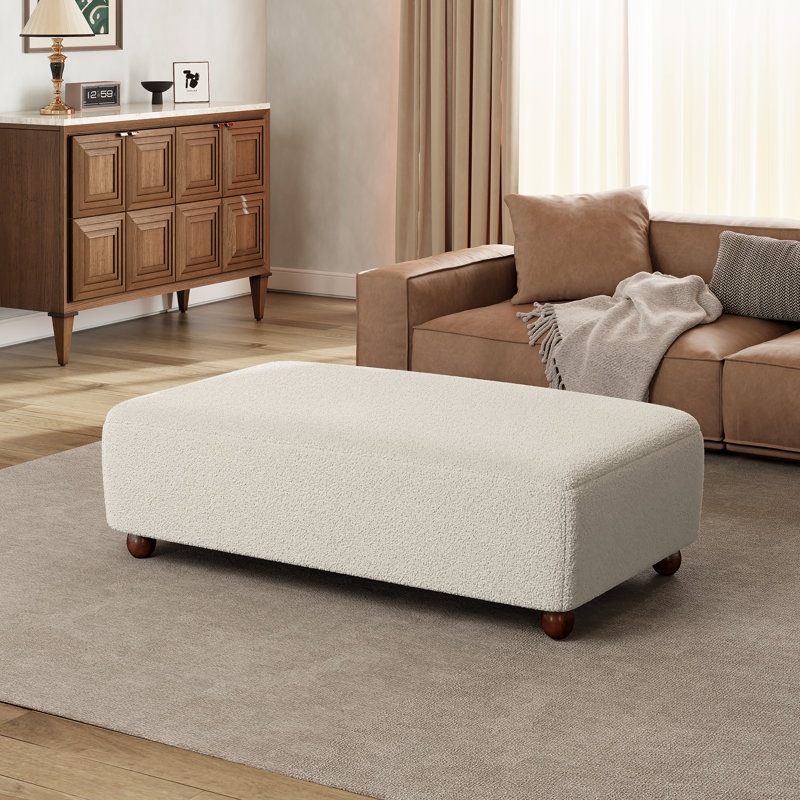 Banc de repose-pieds en tissu massif Callen, Blanc