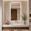Miroir de salle de bain rectangulaire arrondi de 122 x 61 cm (48 x 24 pouces) avec éclairage DEL rétroéclairé, 3 couleurs à intensité variable, fonction antibuée et mémoire, fixation murale horizontale ou verticale, double alimentation (câblée et sur secteur).