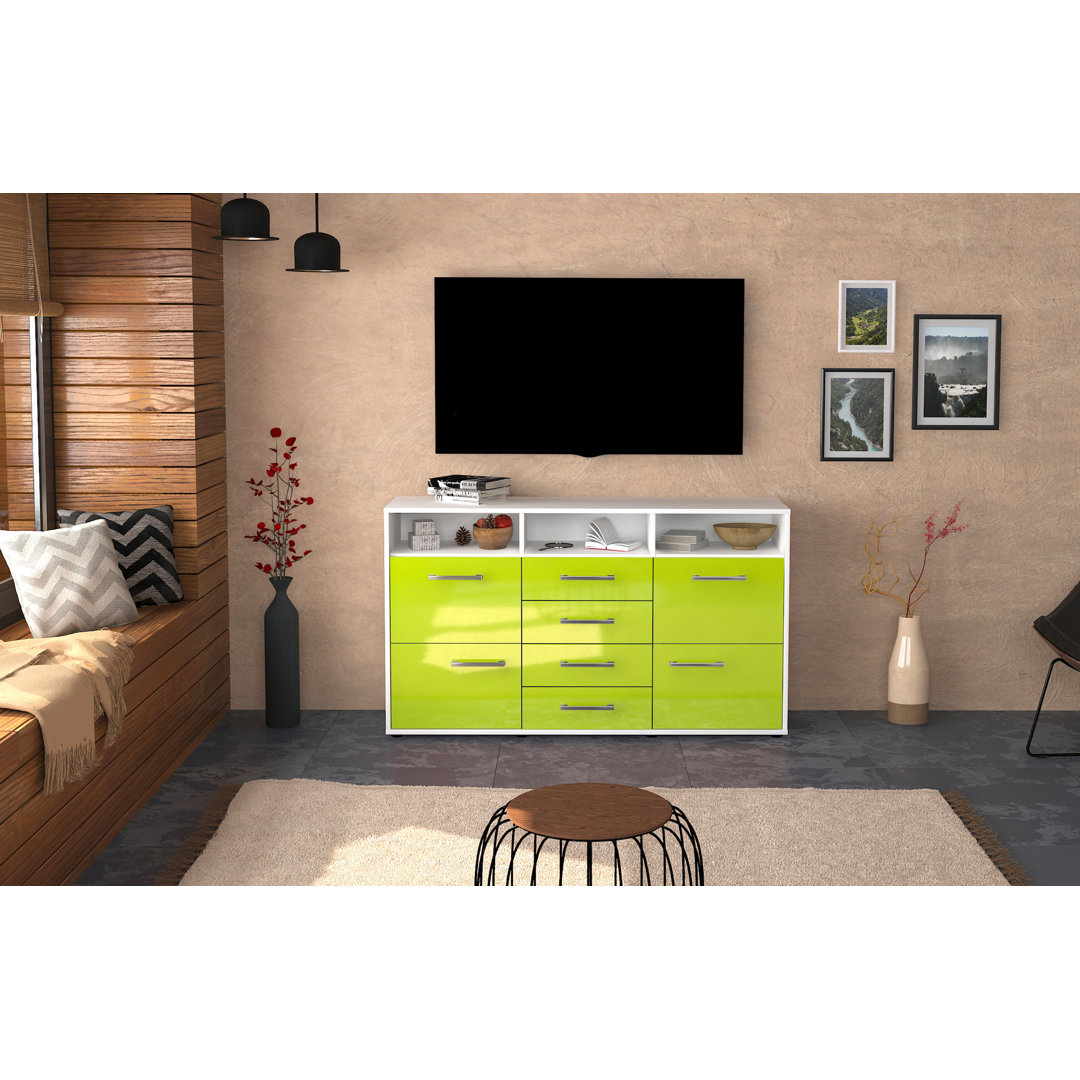 Das Sideboard Donabella hat einen weißen Korpus und eine orange Hochglanzfront. Es misst 136 cm x 79 cm x 35 cm und verf...