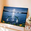 Toile, scène sereine de nuit avec deux dauphins sautant gracieusement de l'art mural The Calm Shimmering Waters-1651689498