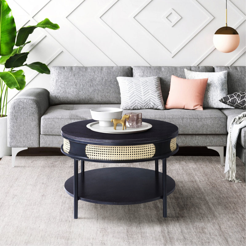 Table basse ronde noire avec tablette inférieure