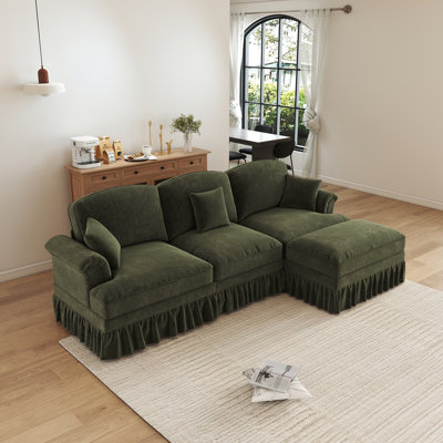 Canapé modulaire en L avec repose-pieds mobile