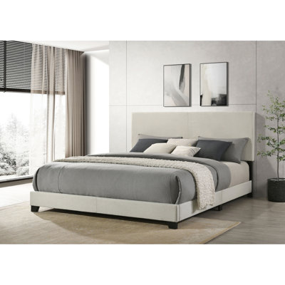 Très grand lit à panneau crème avec tête de lit rembourrée et matériau en bois d'ingénierie pour l'élégance de la chambre à coucher