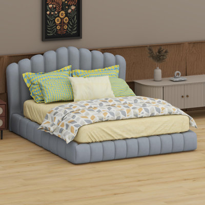 Minimalist Floor Bed Design Highlighted By A Graceful Shell-Shaped Headboard