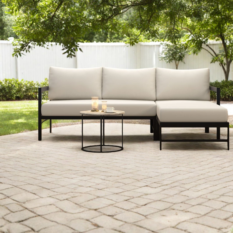 Canapés de patio confortables en forme de L, structure en fer avec coussins épais, idéal pour les espaces extérieurs