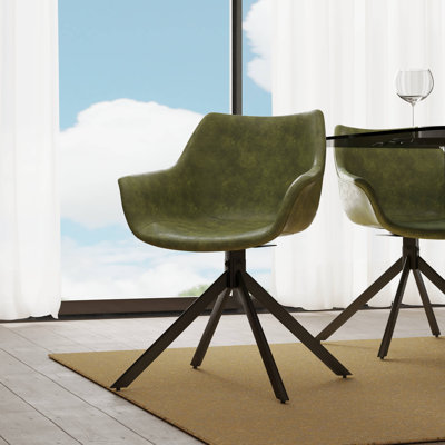 Chaise de salle à manger rembourrée en cuir Matthew avec accoudoirs pivotants à 360 degrés et pieds en fer thermolaqué Matthew Collection Dulaney