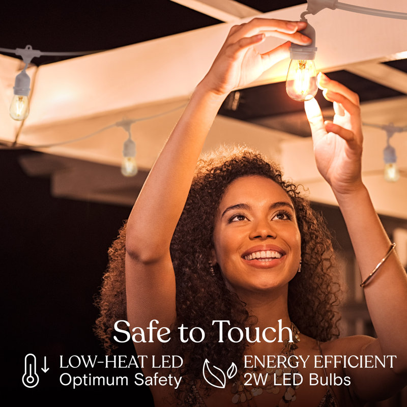 Ambience Pro 48 ft. Plug-In Outdoor Patio LED String Lights with 15 Warm White S14 Edison Bulbs, White Cord, Weatherproof