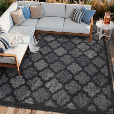 Adianey Red Barrel Studio Easy Care Trellis Charcoal/Black Indoor/Outdoor Area Rug