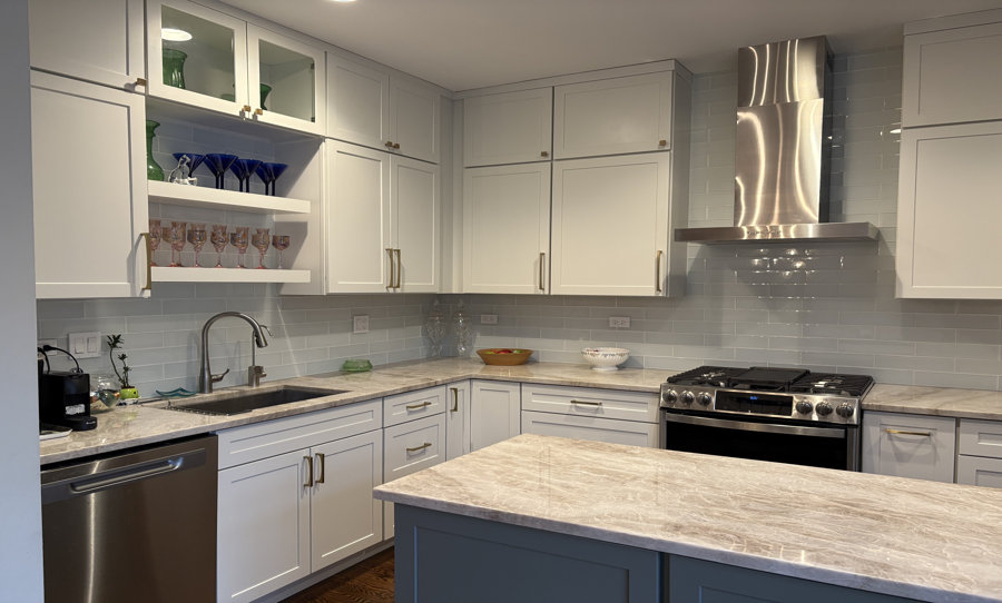 After kitchen renovation; white cabinets with island