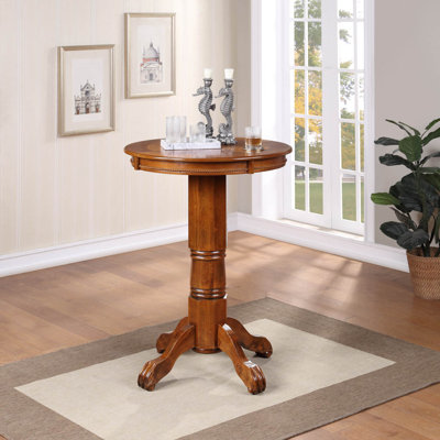 Adelaida 30.25" L Round Solid Wood Table