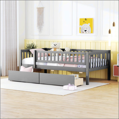 Lit de jour polyvalent avec tiroirs, un choix robuste et peu encombrant pour toute chambre à coucher.