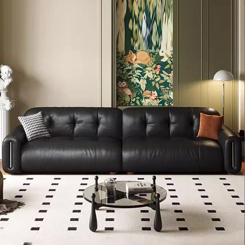 Causeuse-coussin modulable noire en cuir véritable