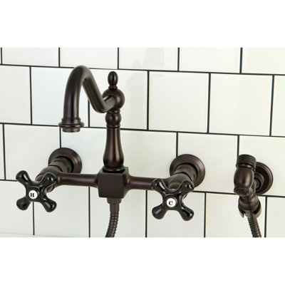 Kingston Brass Duchess Double-Handle 3-Hole Wall-Mount Bridge Kitchen Faucet with Brass Sprayer