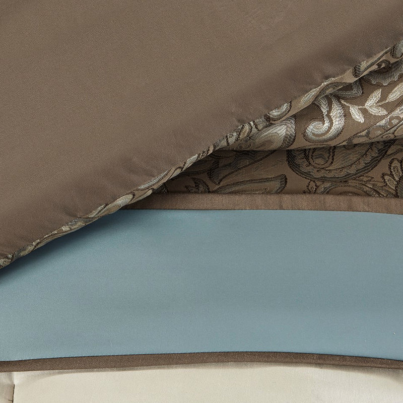 Édredon 7 pièces pour grand lit. Bleu, brun et motif cachemire exquis. Comprend des taies décoratives et des coussins décoratifs