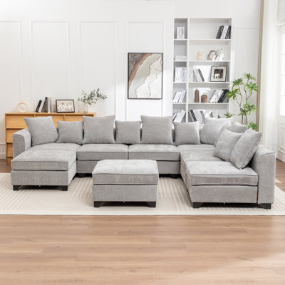 Canapé modulaire rembourré en U avec deux repose-pieds Kempson