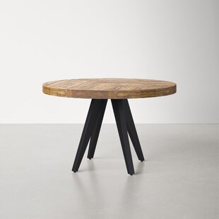 https://assets.wfcdn.com/im/23945787/resize-h310-w310%5Ecompr-r85/1608/160865547/carlo-round-dining-table.jpg