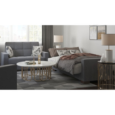 Revêtement convertible gris. Espace de rangement. Se convertit rapidement en lit. Convient aux petits appartements. Housse en chenille. Support de poids de 600 lb. Gris moderne avec compartiment. Into Sleeper. Idéal