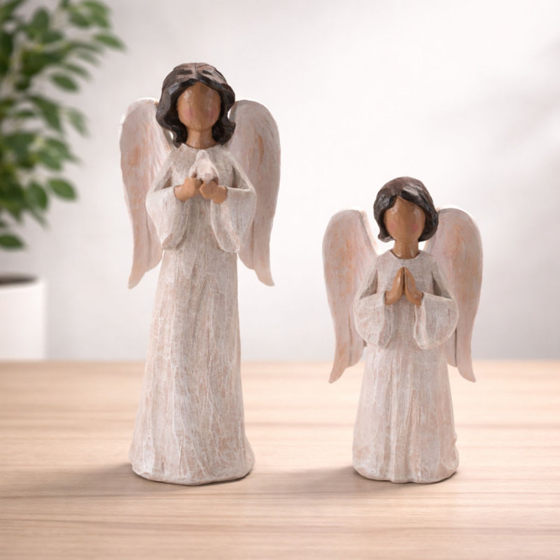 Figurines d'ange priant au fini neutre doux