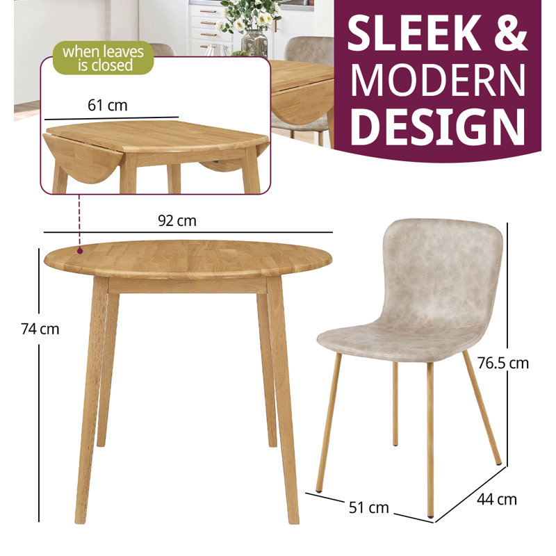 Langdon 4 - Person Drop Leaf Rubberwood Solid Wood Dining Set
