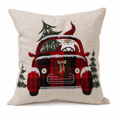  Coussin père Noël monté sur une voiture