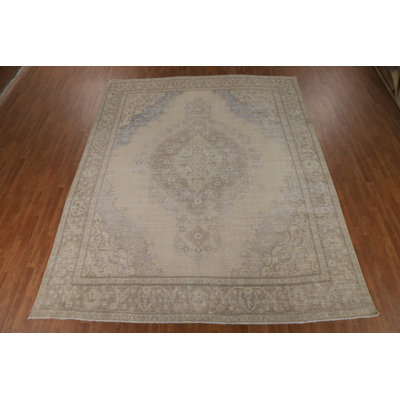 Tapis traditionnel médaillon en laine de couleur discrète 10 x 13