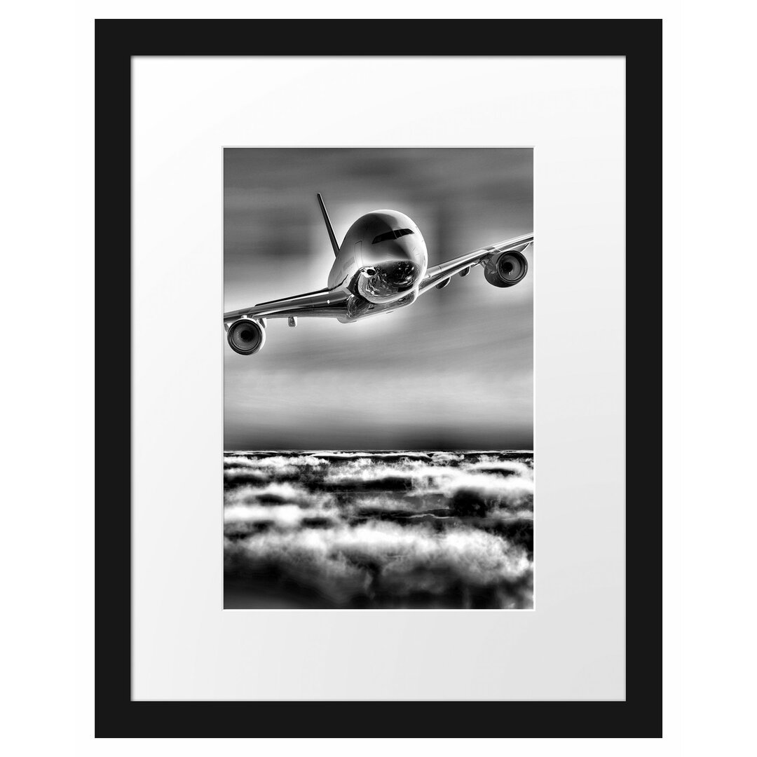 Gerahmtes Poster Flugzeug über den Wolken