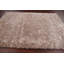 Tapis beige touffeté à la main
