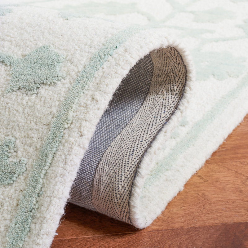 Joran Hand Tufted Wool/Cotton Oriental Rug in Green/Ivory, Rectangle 5' x 8'