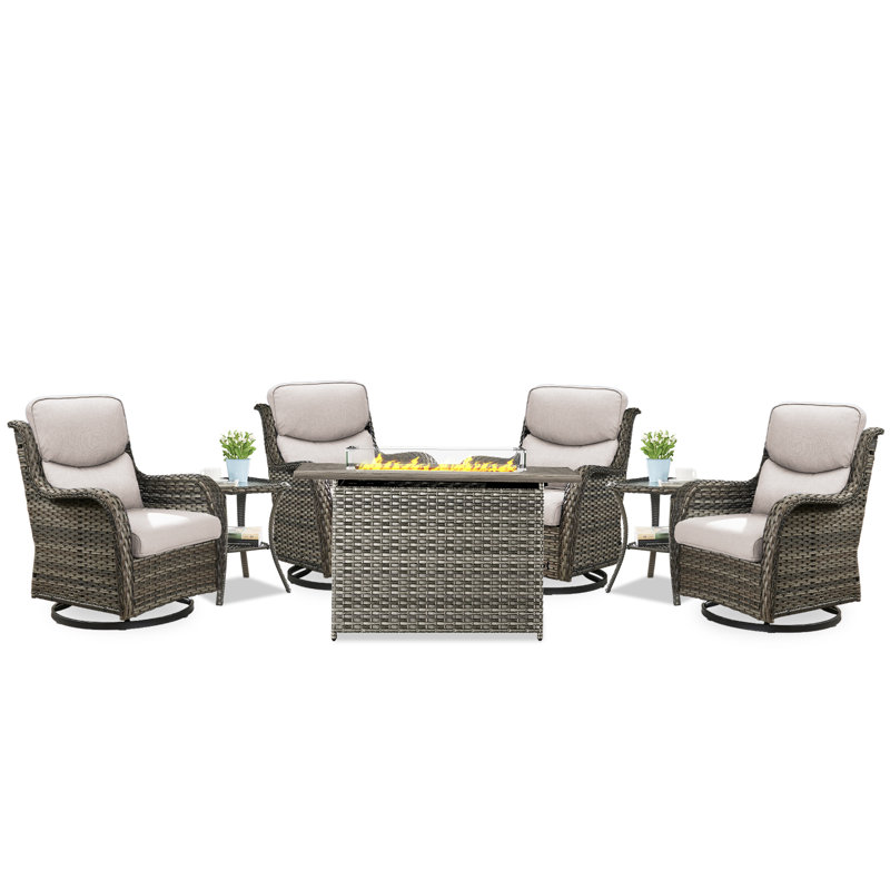 Gray Wicker Swivel Glider Chair with Beige Cushions and Fire Pit Table