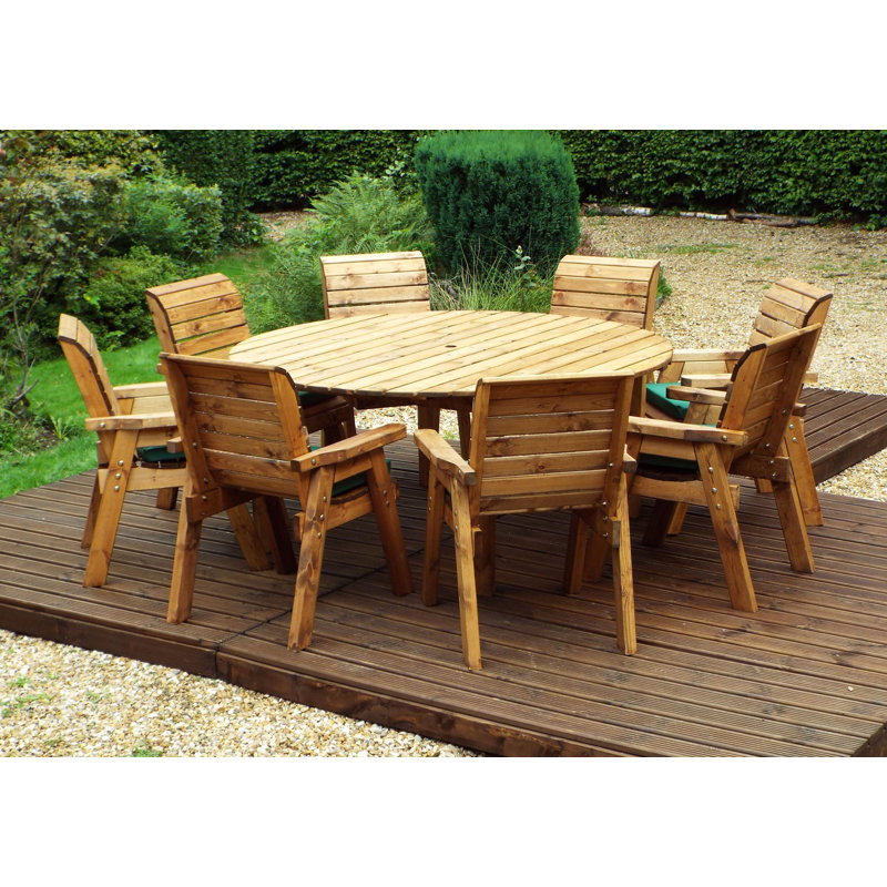 Farris 8 - Person Wood Patio Dining Set with Round Table , Cushions Included, Green
