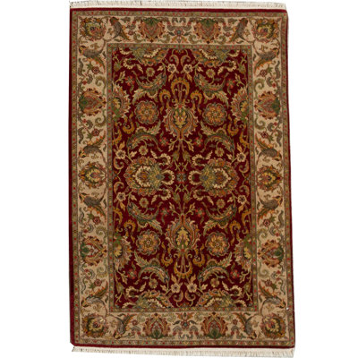 Tapis rouge et ivoire noué à la main de haute qualité