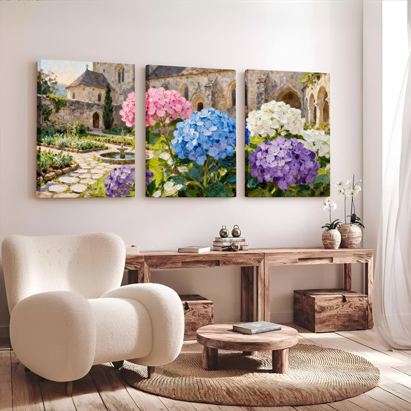 Ensemble de 3 tableaux sur toile tendue représentant un jardin d'hortensias avec une église en pierre, H 36 po x l 72 po