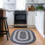 Tapis noir / blanc tressé à la main Enika-847346323