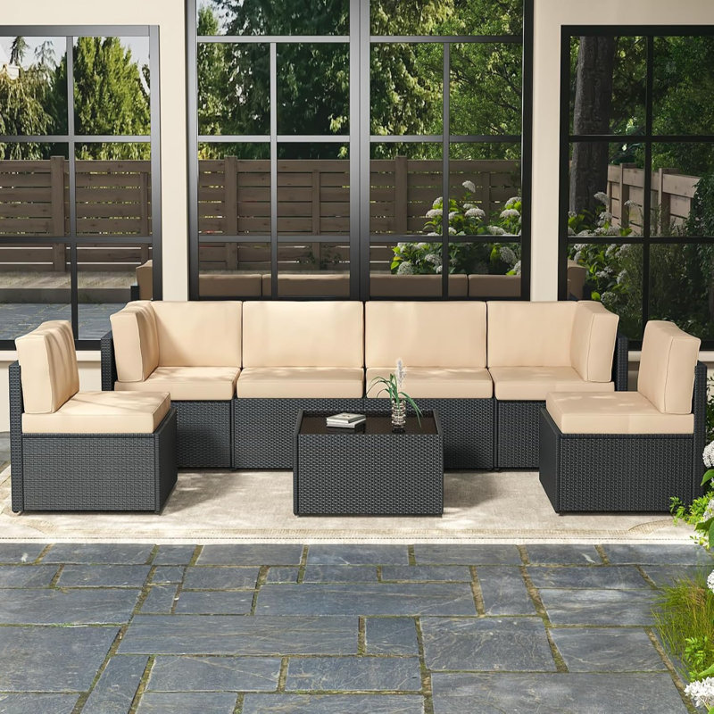 Emilienne 7 Piece Rattan Sectional Seating Group with Cushions, Black, Beige