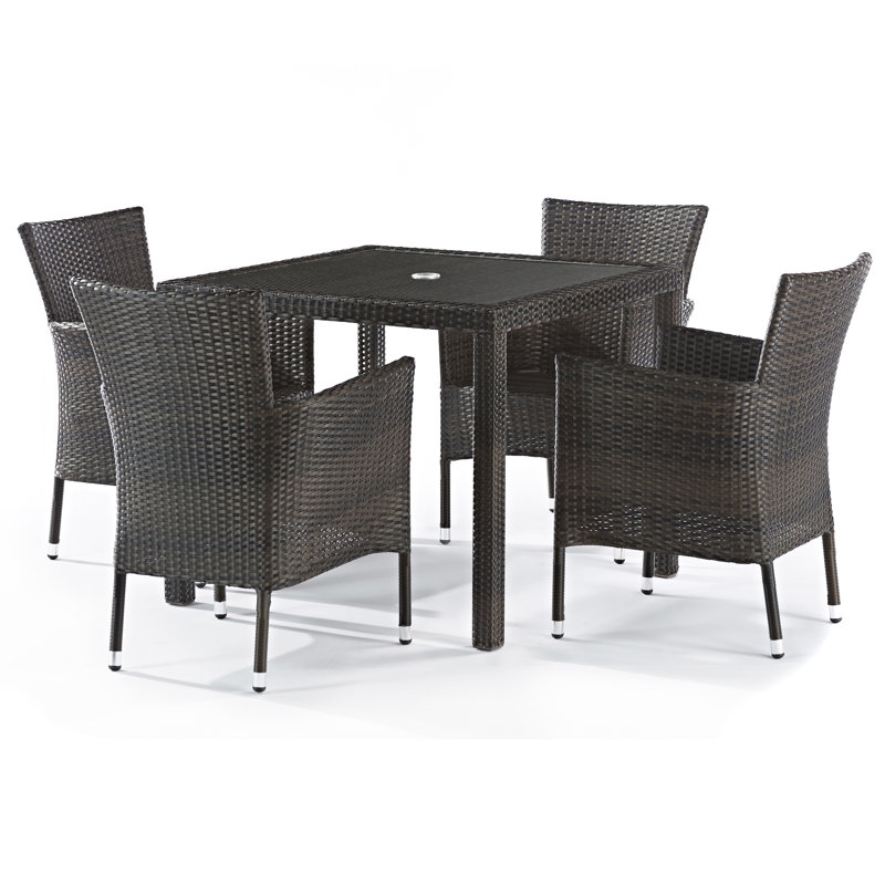 Sandra 4 - Person Wicker Patio Dining Set with Square Table , Cushions Included