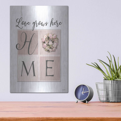 «Love Grows Here Home» par Lori Deiter, art mural en métal