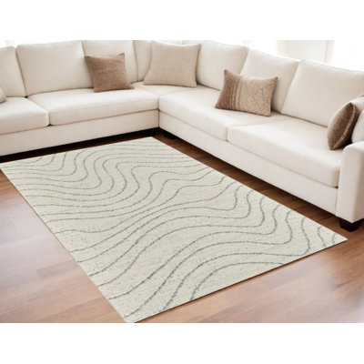 5' X 8' Cream and Beige Abstract Area Rug