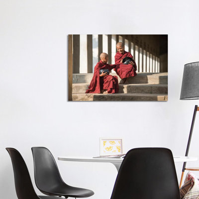 Two Young Novice Monks With Rice Bowl, Bagan, Myanmar by Jan Becke - Wrapped Canvas Print