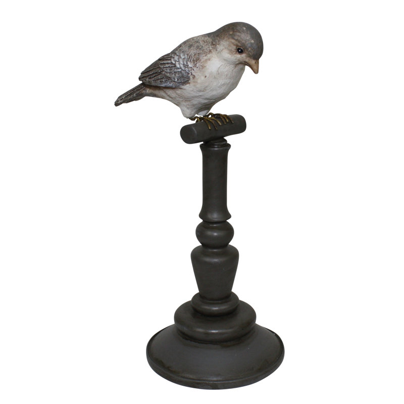 Figurine sur pied oiseau
