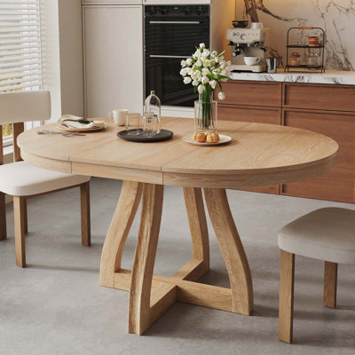 Table de salle à manger ronde extensible pour 4 à 6 personnes avec pieds de table courbés