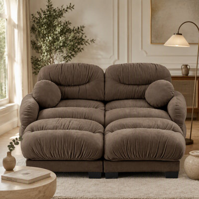 Pleated Chenille 2-Seater Modular L-Shape Sofa with Ergonomic Foam, Curved Armrests, Two Ottomans, and Round Throw Pillows.